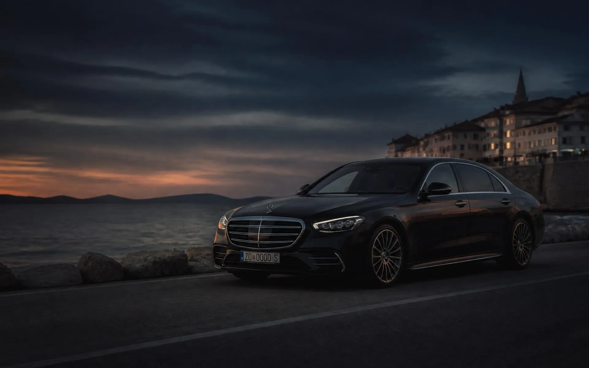 Private black Mercedes on the Zadar coast at dusk